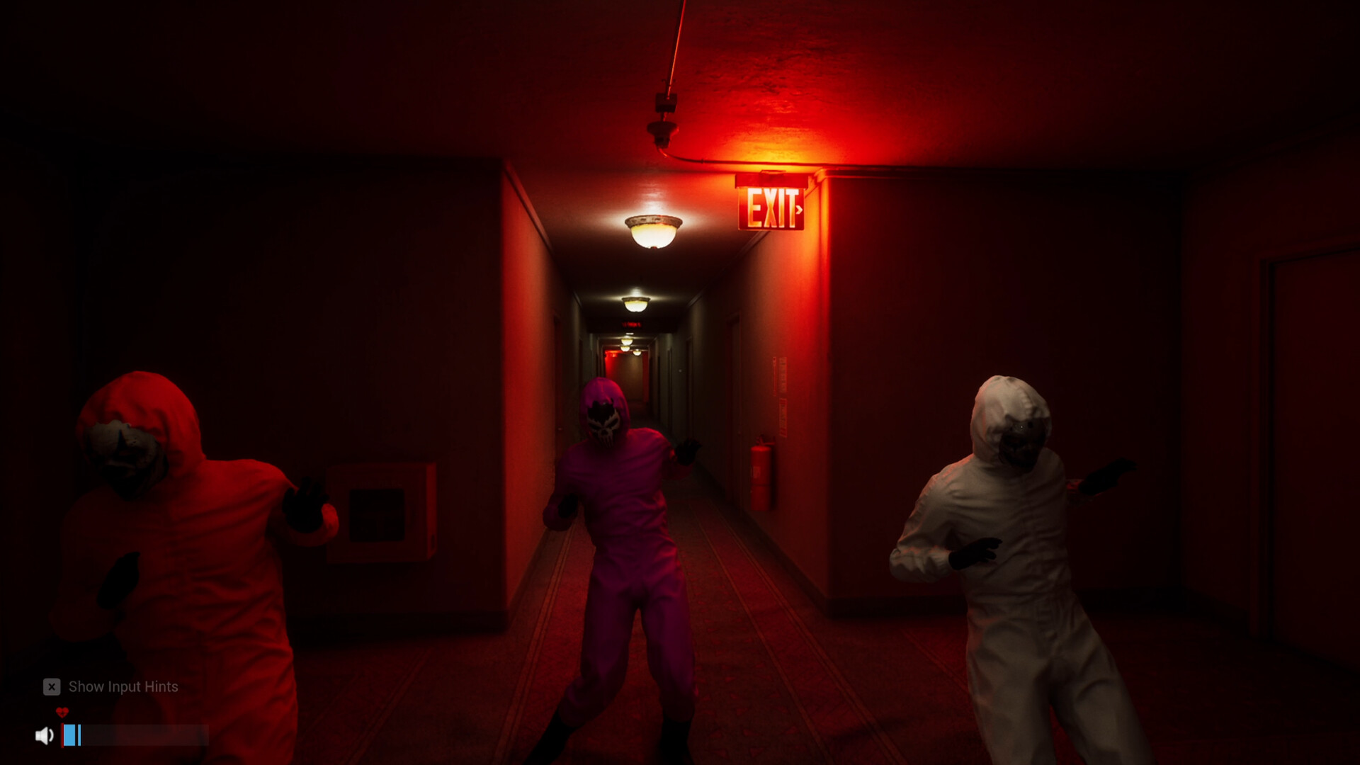 Three agents in protective suits move through a red-lit corridor